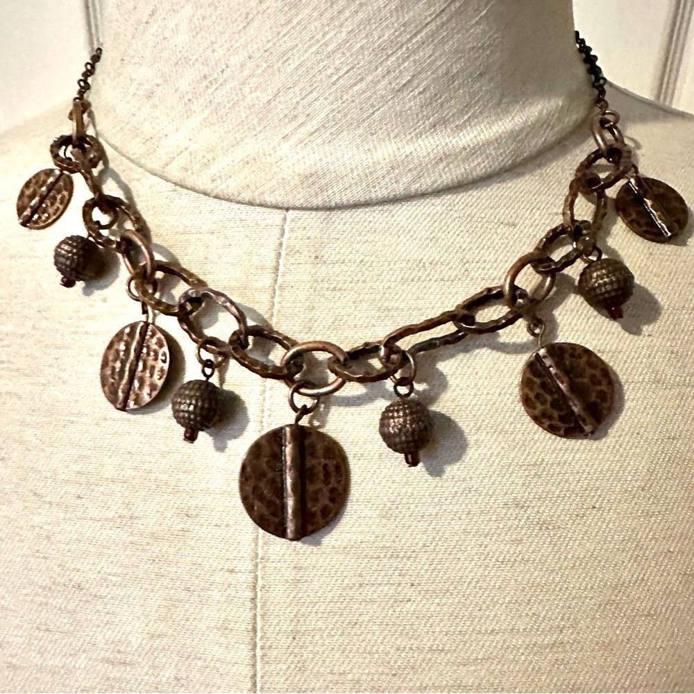 Copper tone charm necklace